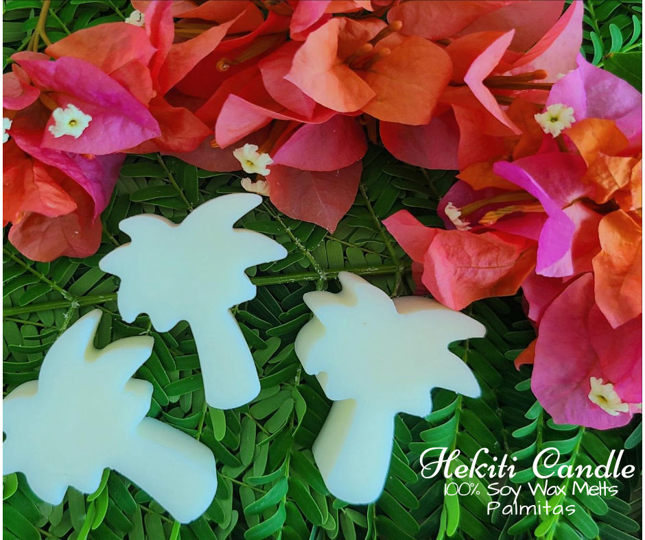 Green background from leaves and pink flowers surround the top of three white palm trees. Written at the bottom right says, Hekiti Candle 100% soy wax melts Palmitas