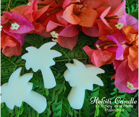 Green background from leaves and pink flowers surround the top of three white palm trees. Written at the bottom right says, Hekiti Candle 100% soy wax melts Palmitas